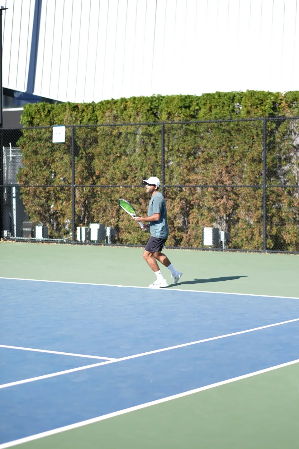 Preparing for a point on the blue courts at the 2026 Manhattan Ladder Finals