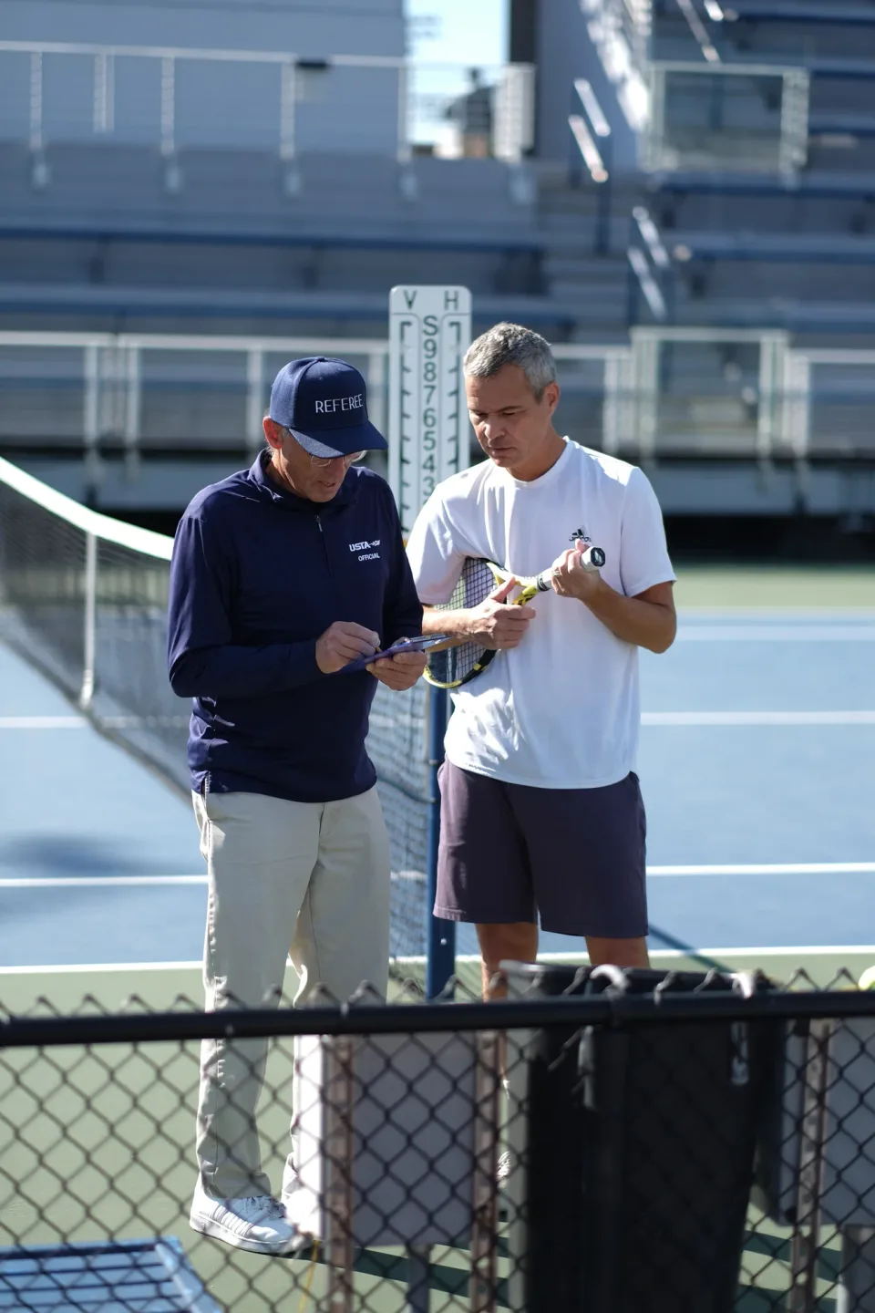 Talking beside the court at the 2026 Manhattan Ladder Finals
