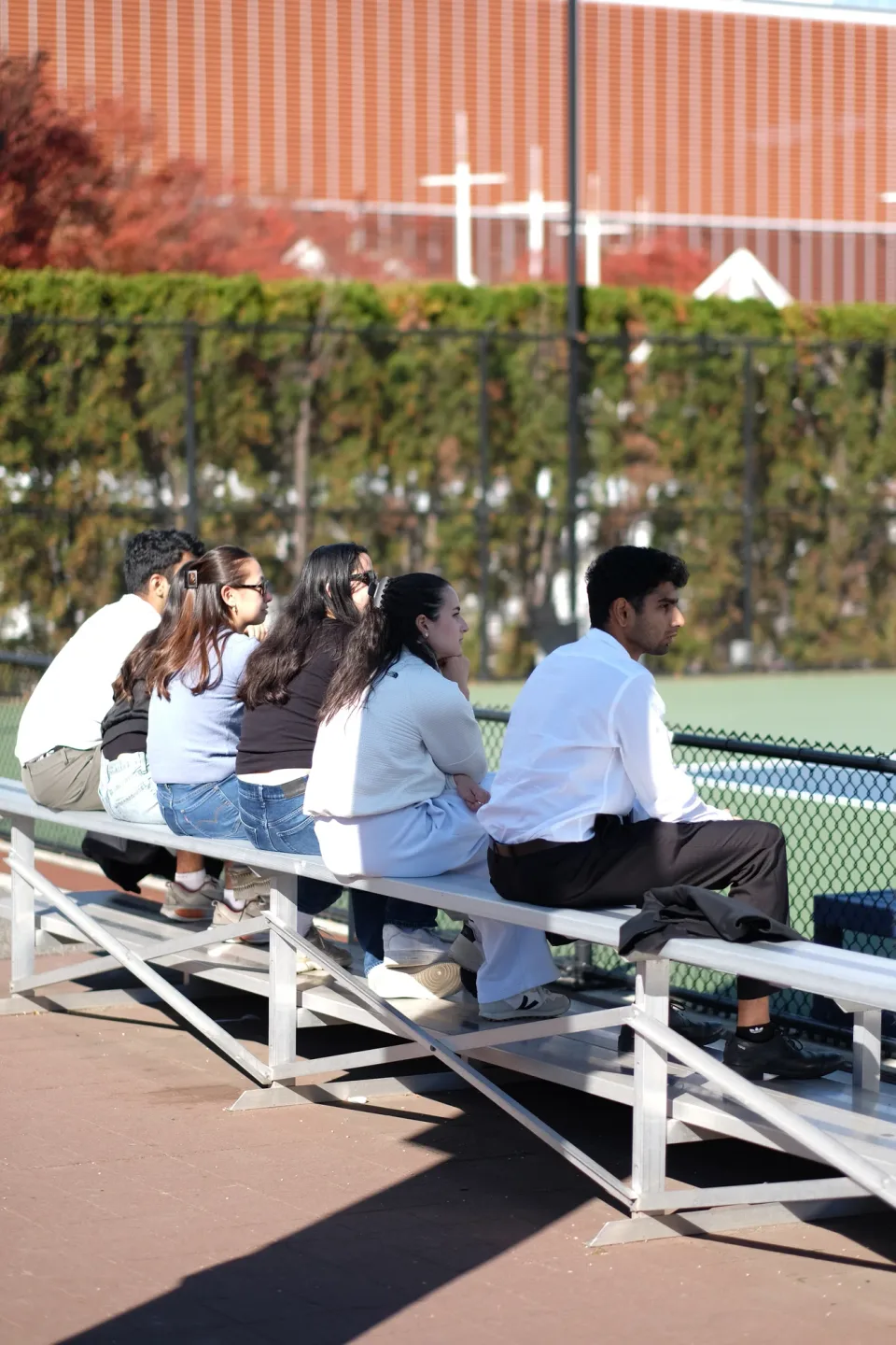 Friends and family watch from the benches at the 2026 Manhattan Ladder Finals