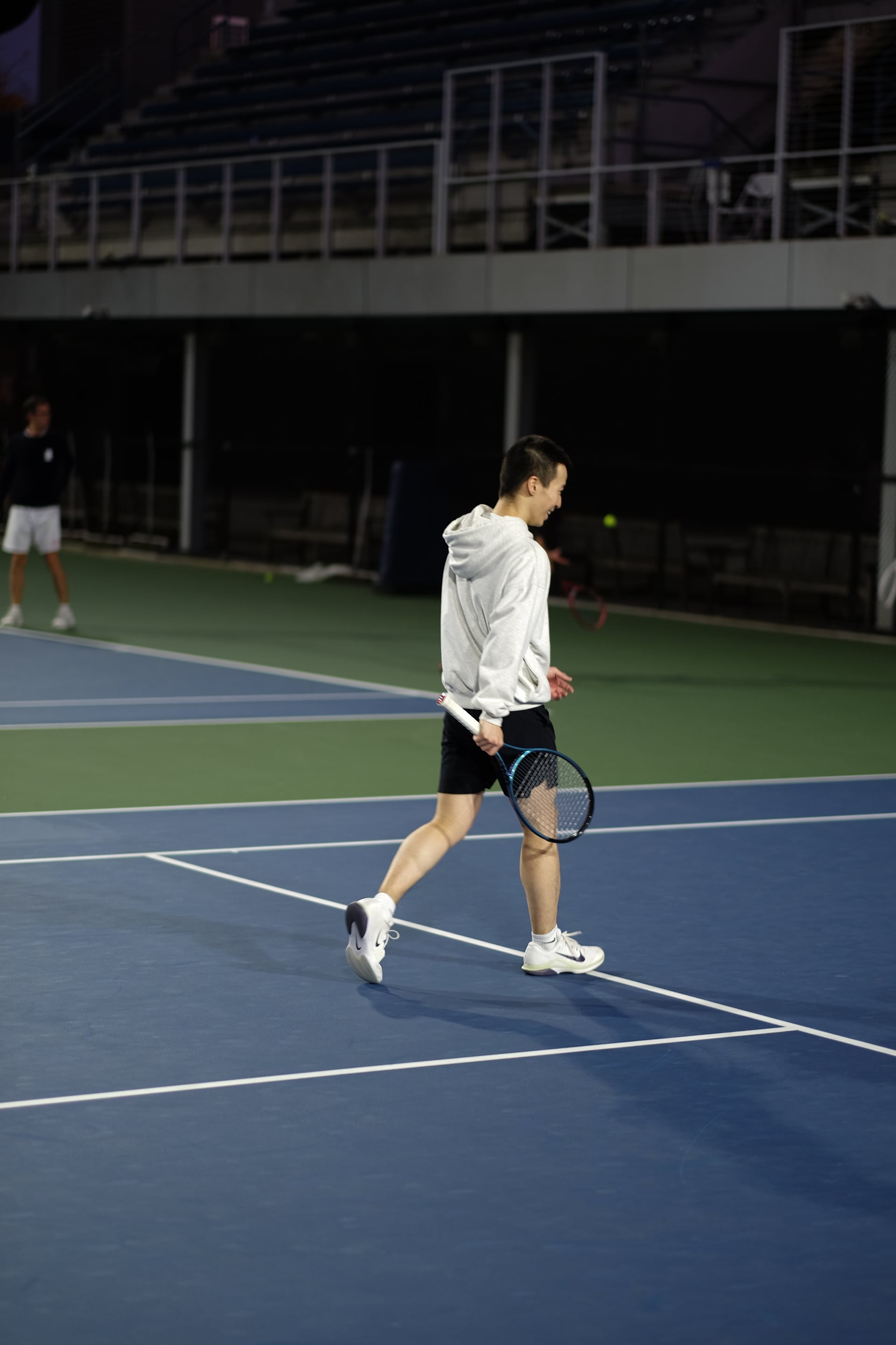 A player smiling while changing position on court at Saturday Sunset Club, October 17, 2026