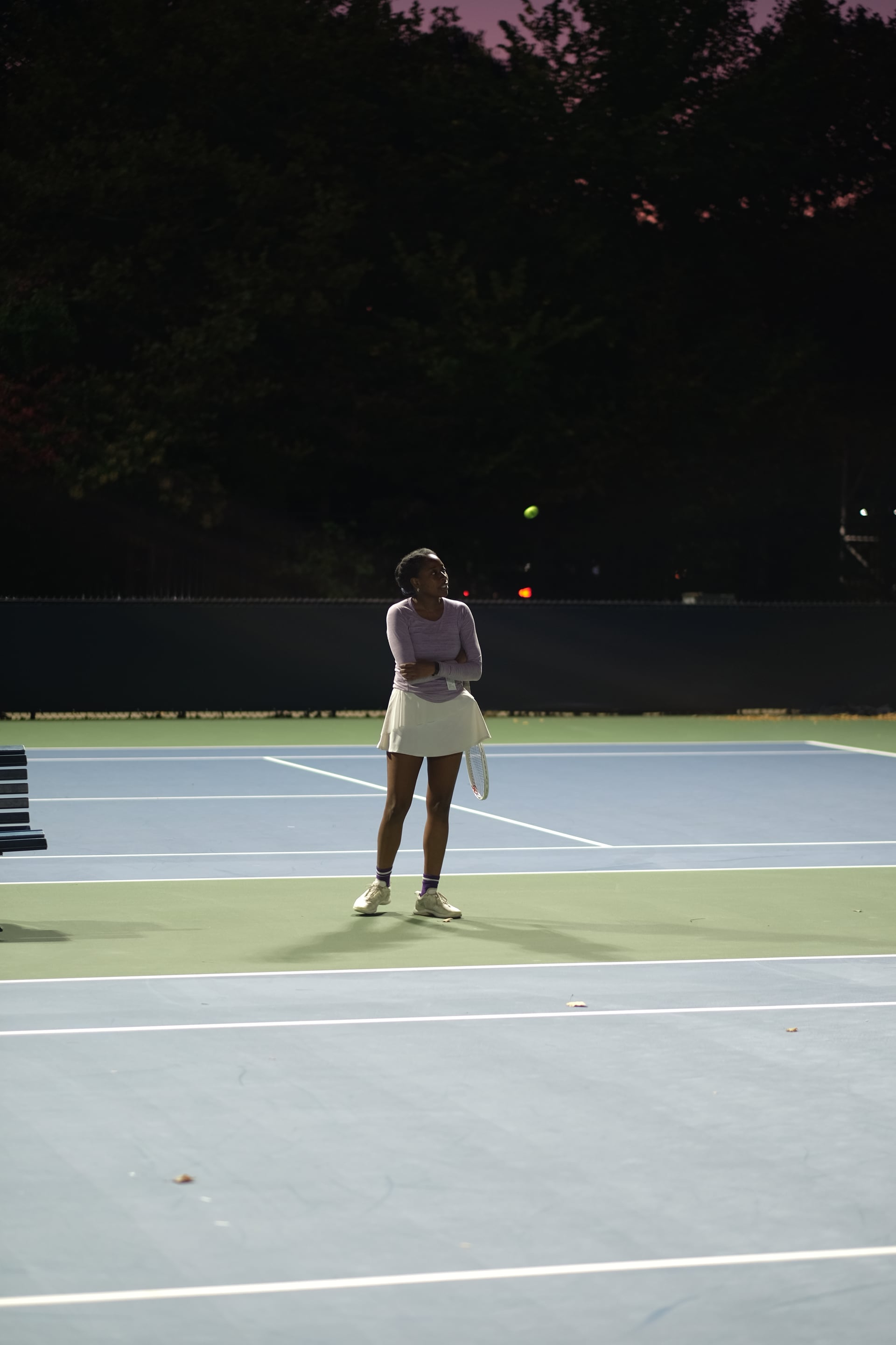 A player watching a ball against the evening sky at Saturday Sunset Club, October 17, 2026