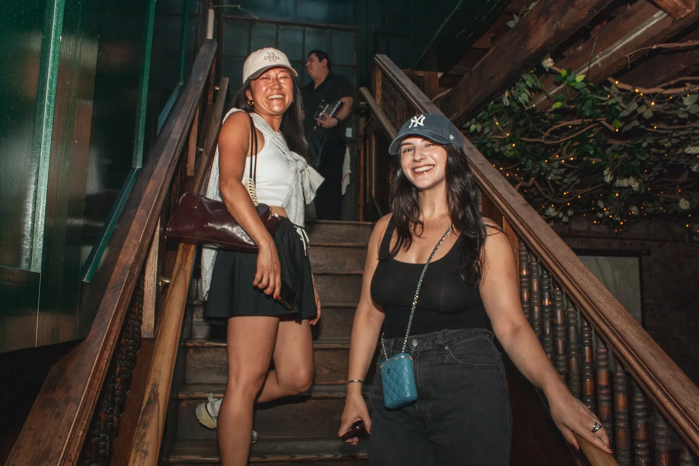 Guests on the stairs at Brass Monkey