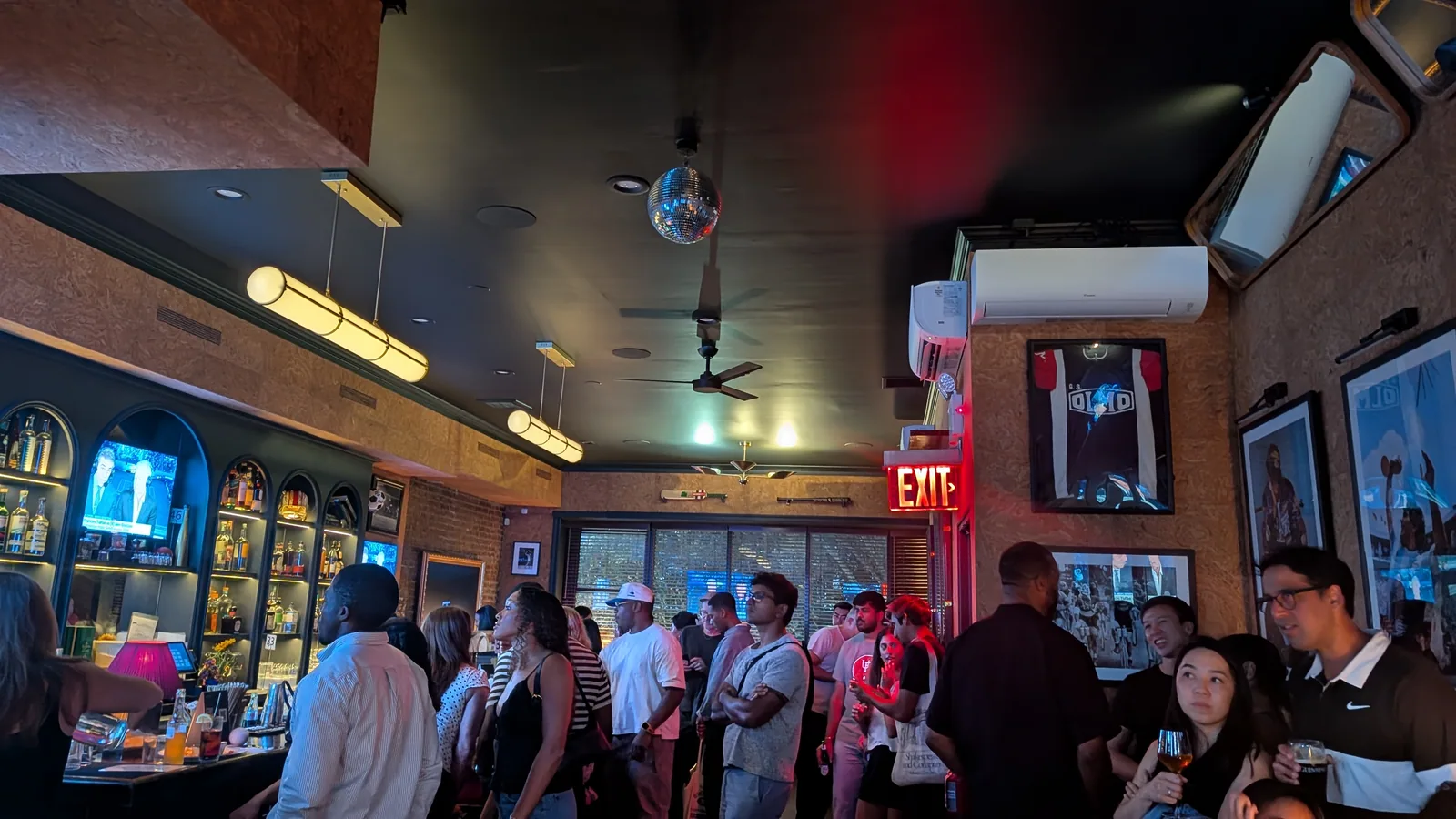 Guests gathered inside Brass Monkey for the US Open men’s semifinals watch party