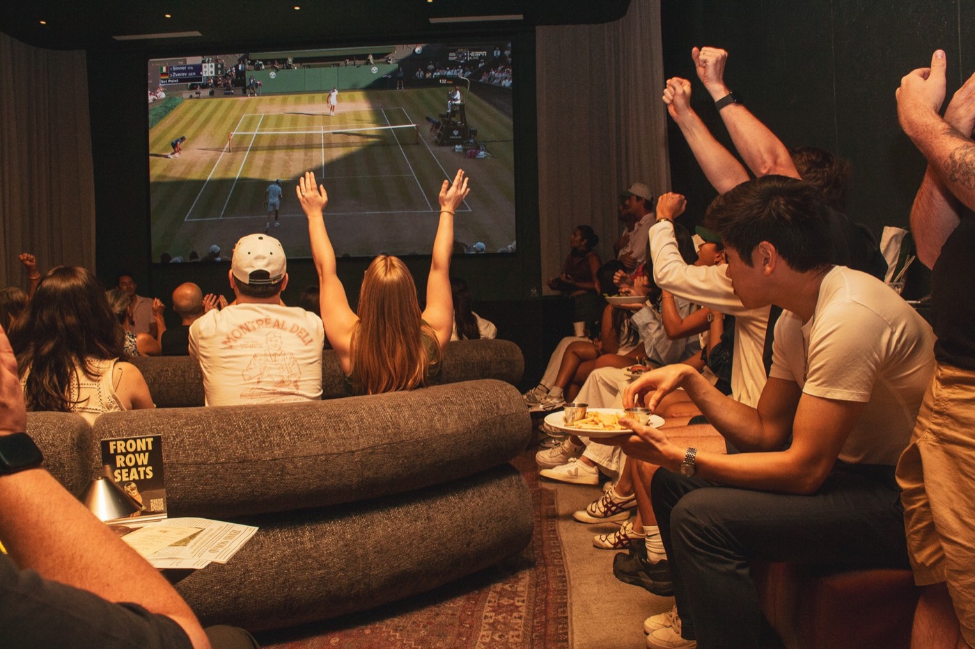 MTA members celebrating at a Wimbledon watch party