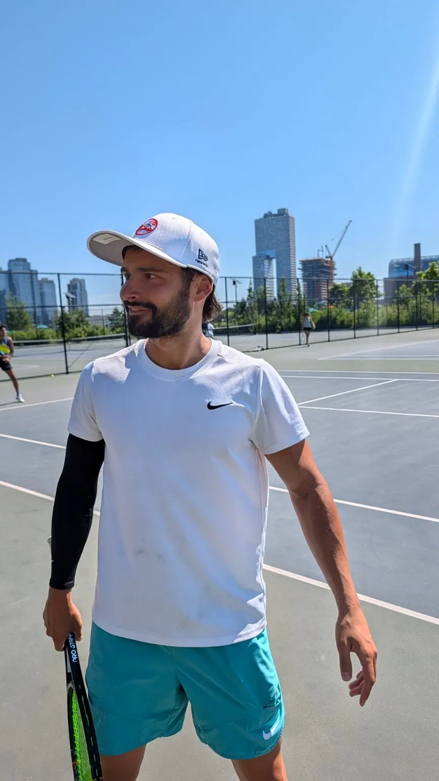 A Hydracourt player holding a racket on the Brian Watkins Tennis Center court
